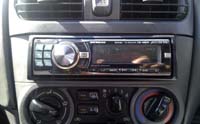 Фотография установки магнитолы Alpine CDE-9880R в Nissan Sunny